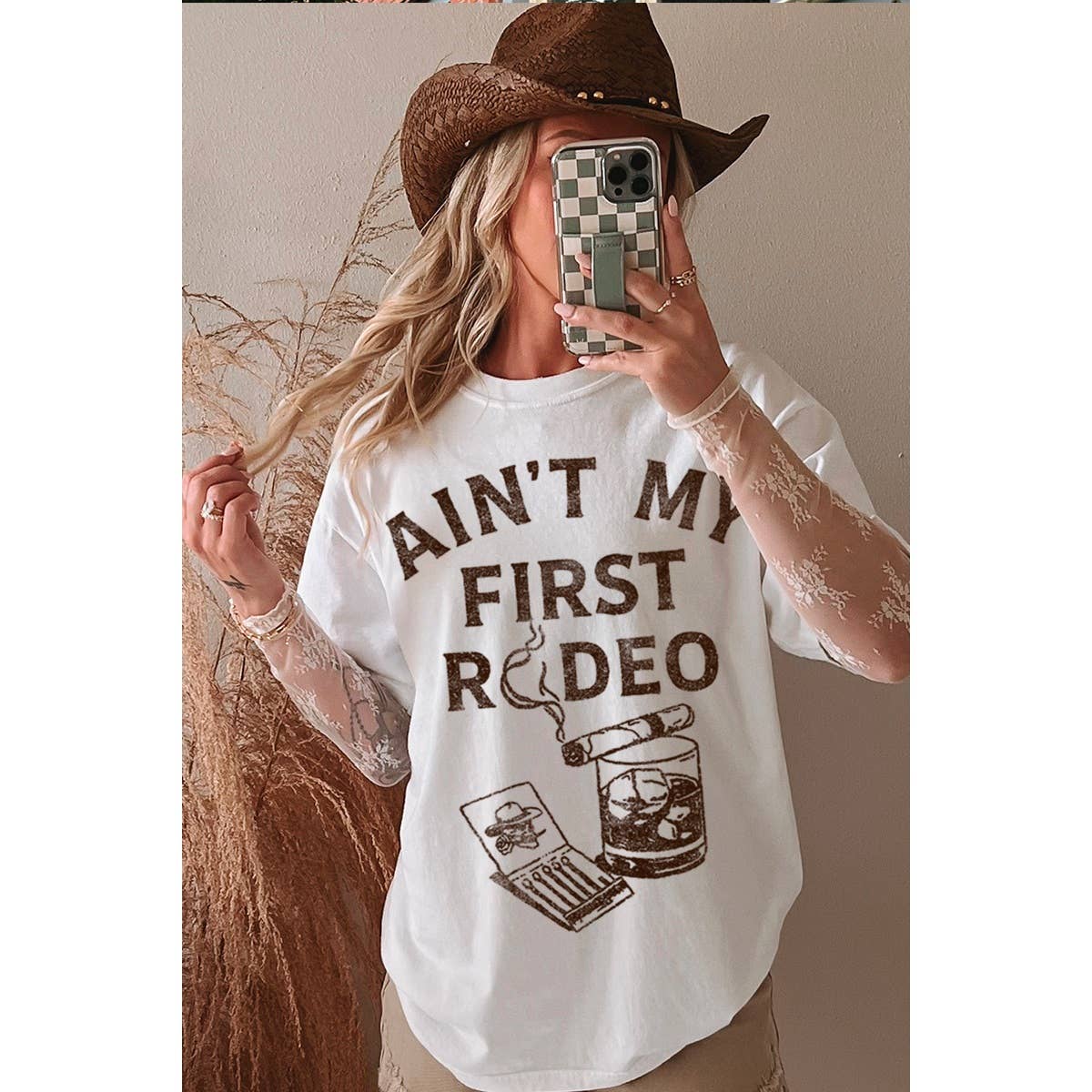 AINT MY FIRST RODEO WESTERN GRAPHIC OVERSIZED TEE
